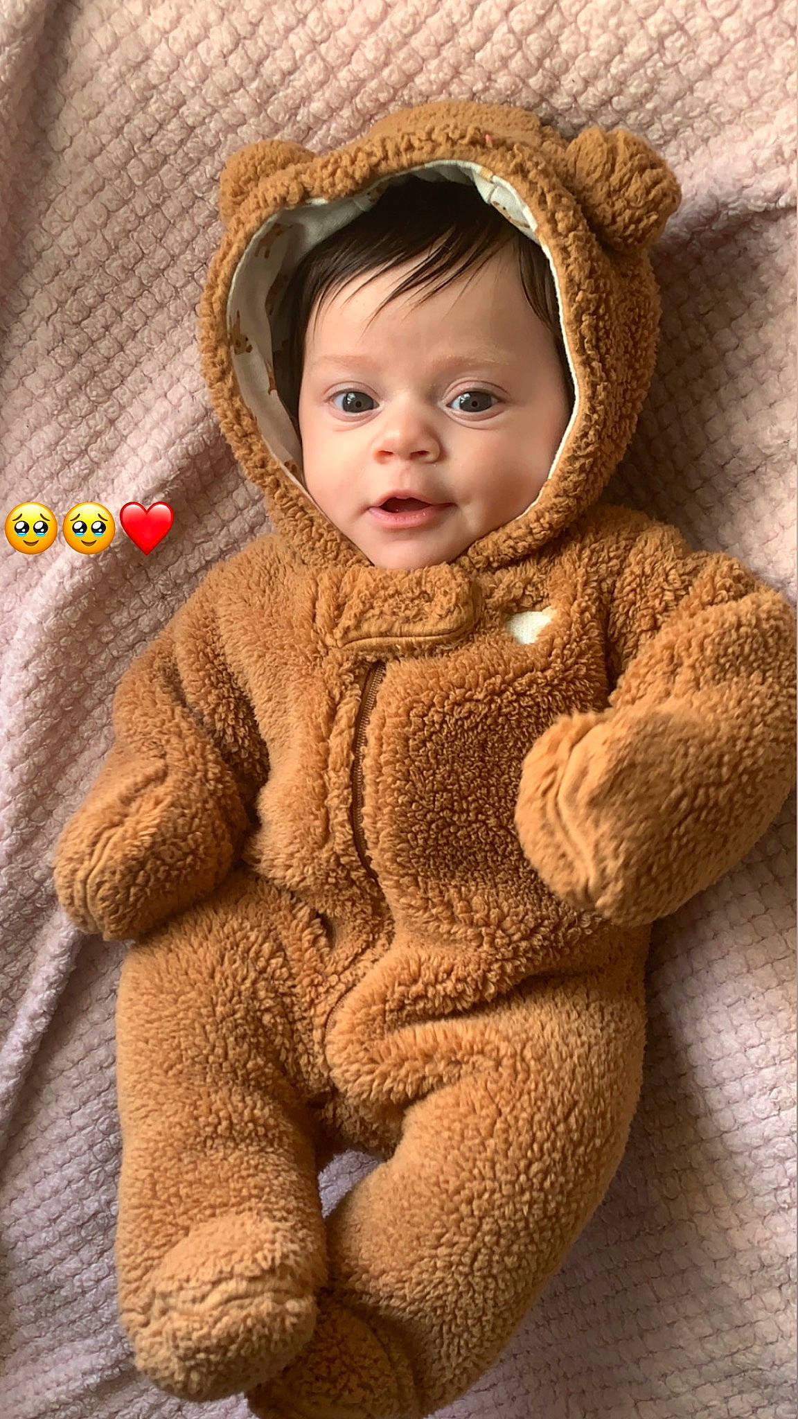 Fallon joined the competition — help win amazing prizes! baby, baby_toddler_clothing, beige, brown, cheek, eye, face, headgear, jacket, linens, nose, outerwear, pattern, person, skin, sleeve, textile, toddler, wood, wool