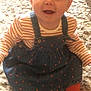 Freya joined the competition — help win amazing prizes! baby, child, smiling, denim_dress, striped_shirt, red_socks, sitting, rug, indoor, cute, happy, face, person, infant, clothing, pattern, texture, young_child, portrait, casual