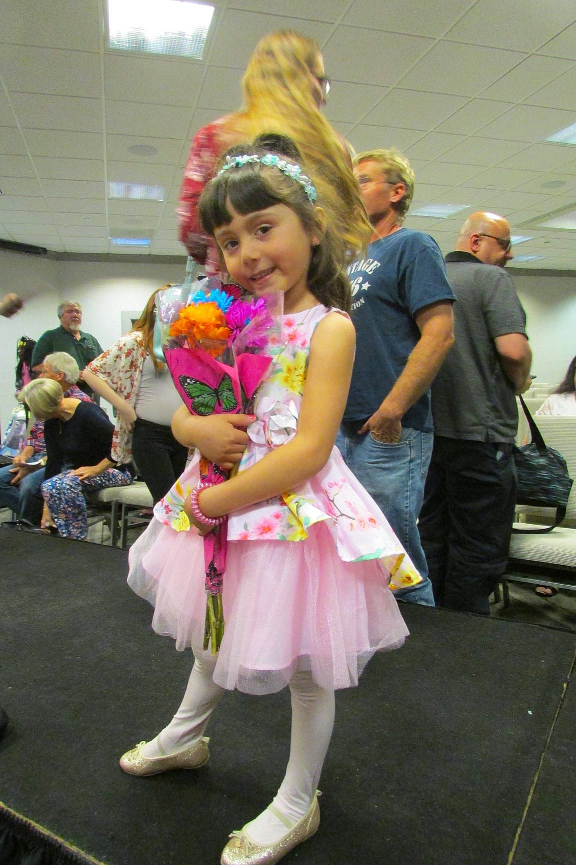 Cassandra joined the competition — help win amazing prizes! child, cosplay, costume, dance, dancer, event, fictional_character, fun, headwear, performance, person, pink, plant