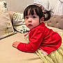 Lillian is registered to the contest to win money with this photo: toddler, child, indoor, couch, red_sweater, yellow_skirt, headband, floral_pillow, curly_hair, cute, portrait, young_child, innocence, soft_lighting, home, casual, looking_at_camera, pale_skin, comfortable, cozy