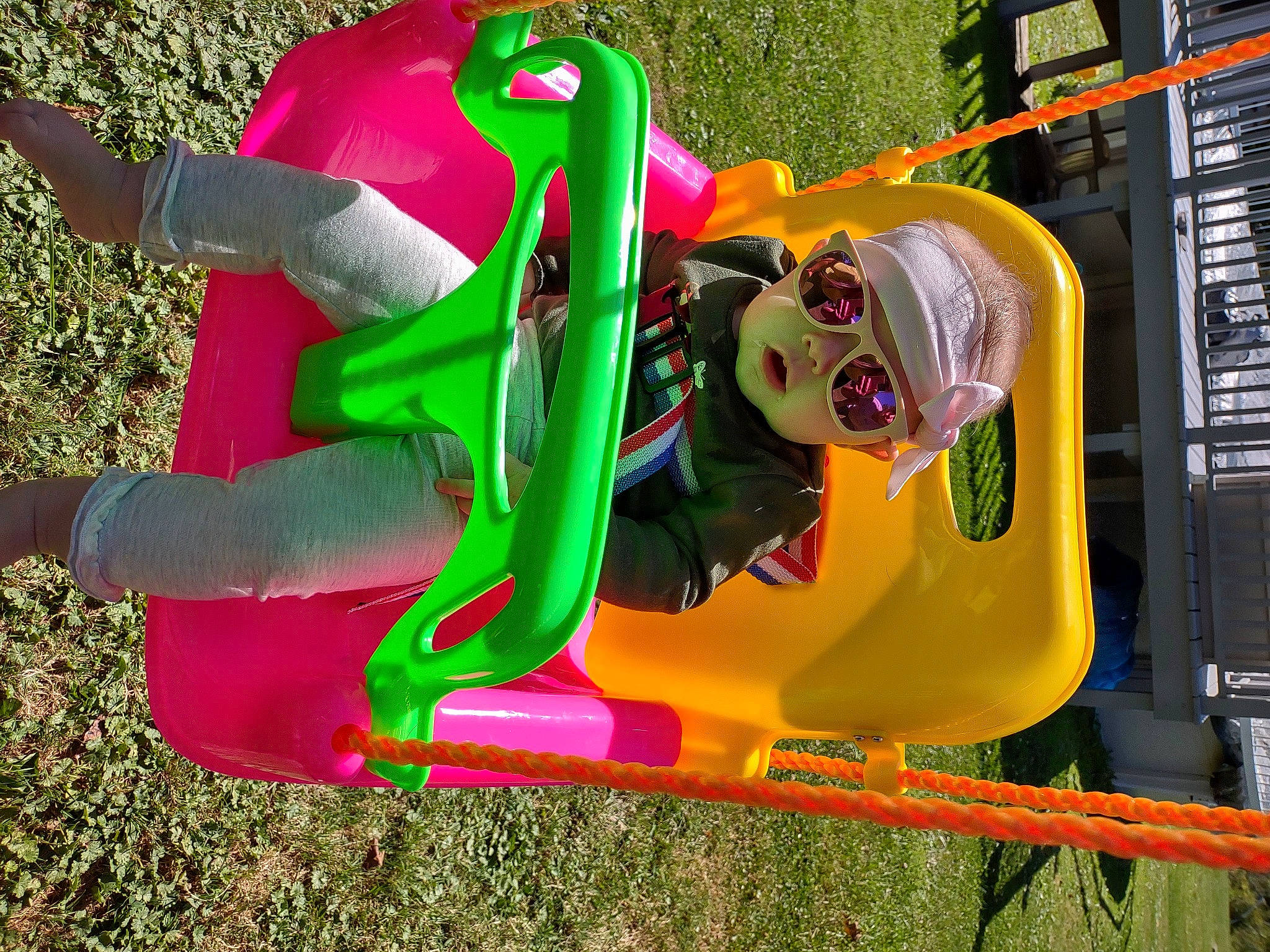 Madelynn is registered to the contest to win money with this photo: amusement_ride, child, chute, city, fictional_character, fun, games, grass, leisure, magenta, outdoor_play_equipment, person, plant, play, playground, playground_slide, recreation, toddler