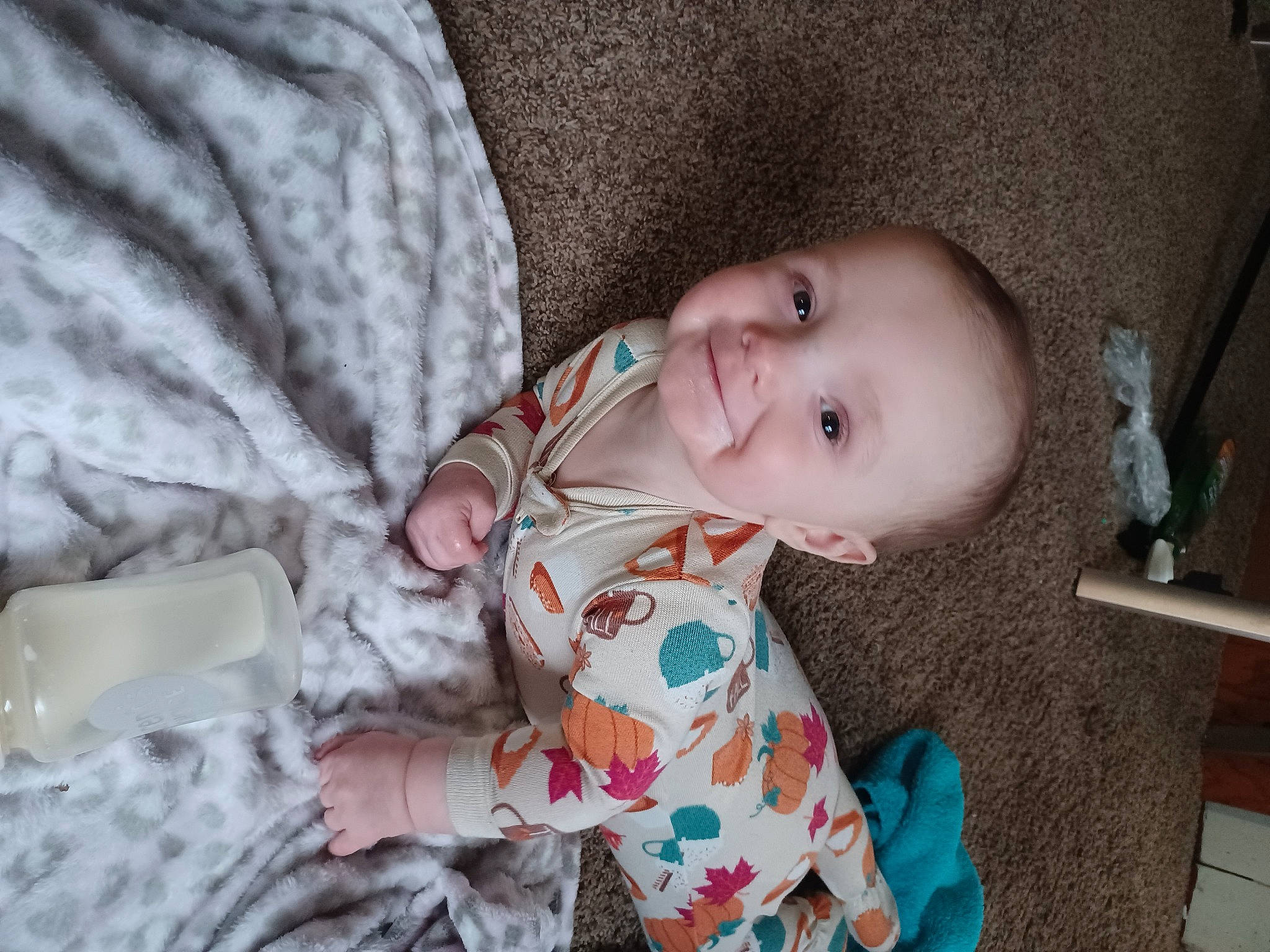 Blaine joined the competition — help win amazing prizes! baby, baby_products, baby_toddler_clothing, cheek, child, comfort, flooring, fun, grass, happy, iris, linens, nose, pattern, person, sitting, skin, sleeve, smile, toddler