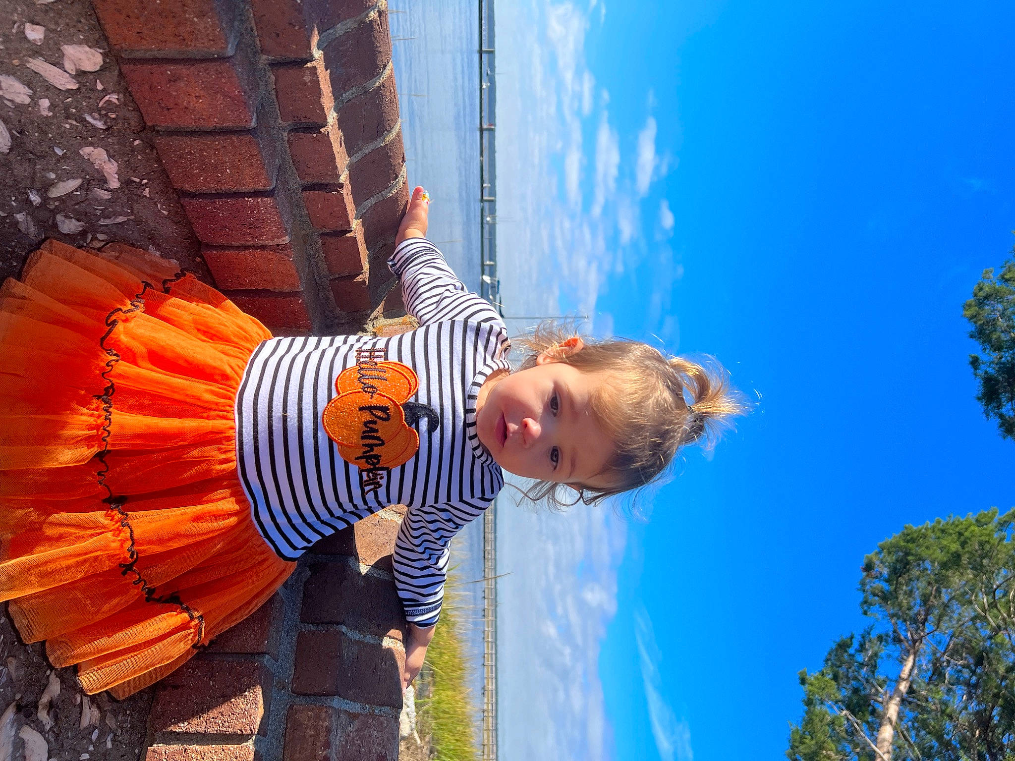 Rylee joined the competition — help win amazing prizes! azure, blue, cloud, electric_blue, facade, fun, happy, leisure, people_in_nature, person, plant, sky, smile, toddler, travel, tree, water, wood