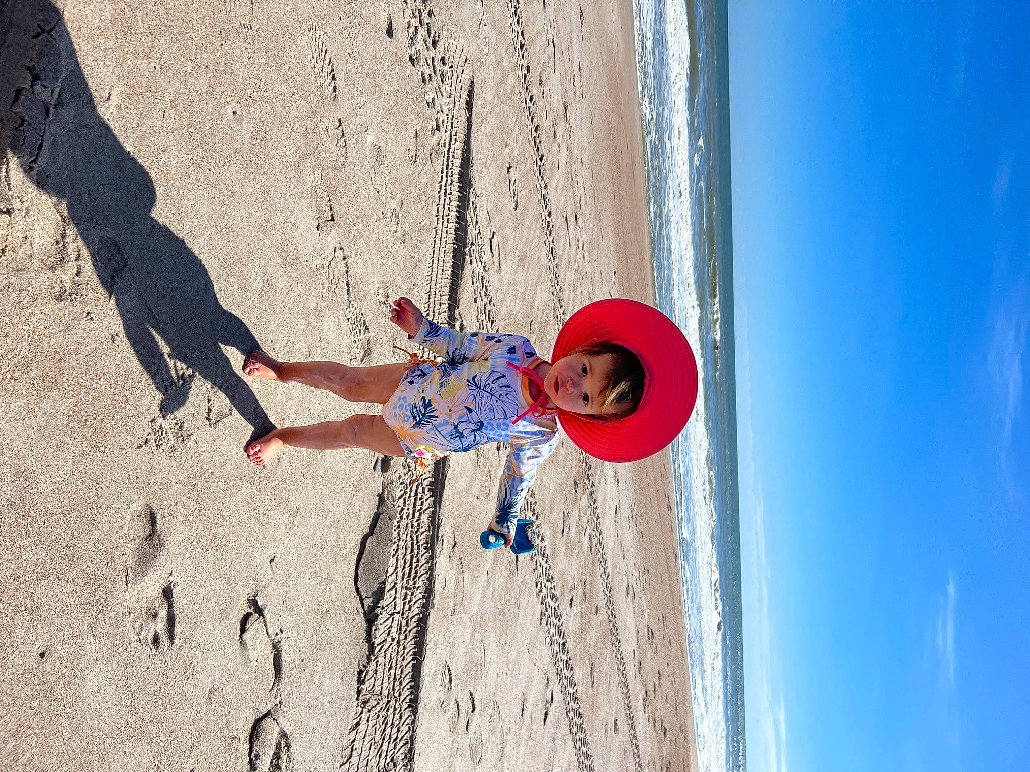 Rylee joined the competition — help win amazing prizes! adventure, azure, beach, elbow, electric_blue, extreme_sport, fun, happy, hat, helmet, landscape, leisure, line, person, recreation, sand, shadow, sky, sport_climbing, water