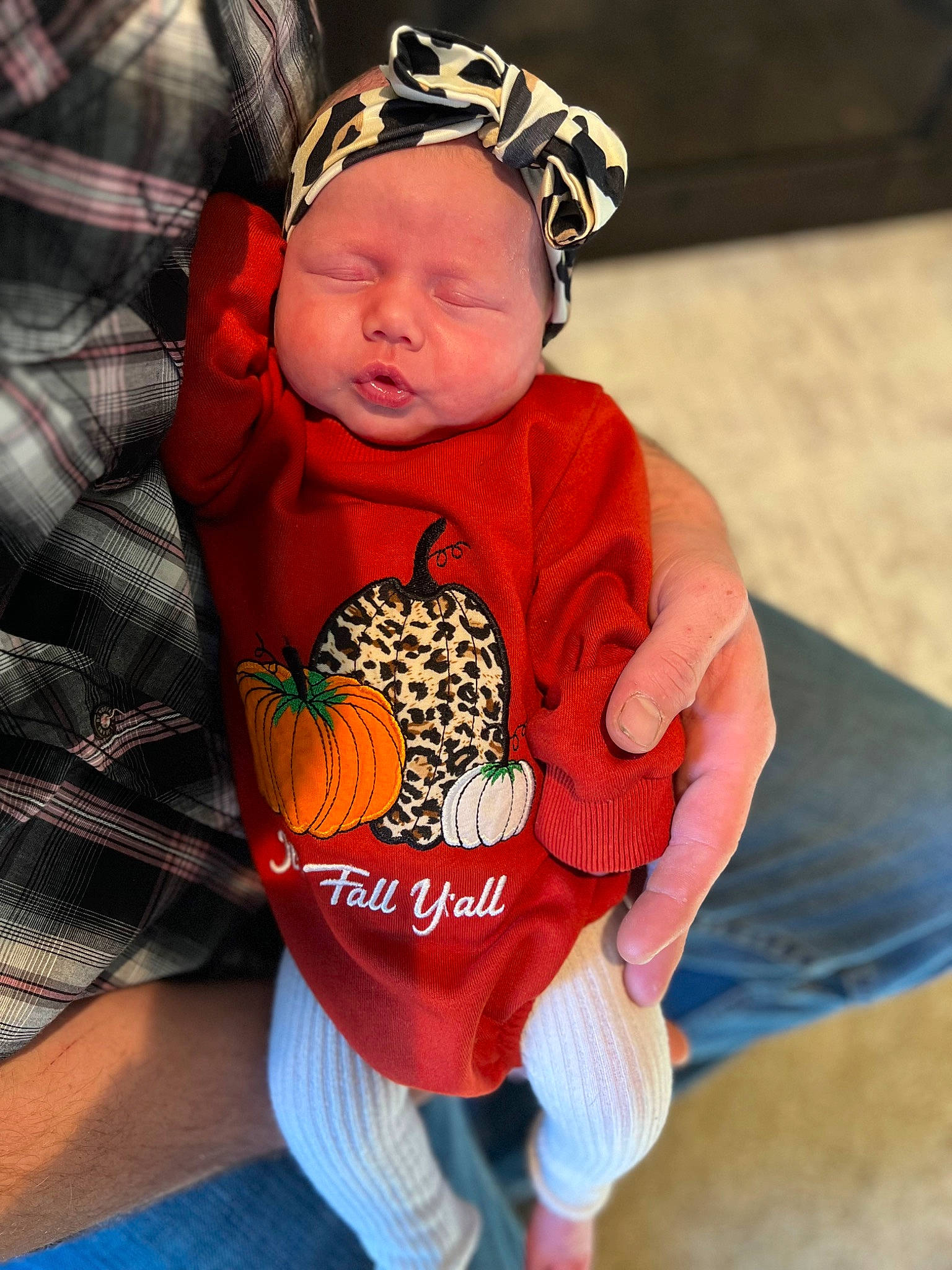 Makayla is registered to the contest to win money with this photo: baby, baby_products, baby_sleeping, baby_toddler_clothing, beanie, cap, child, fashion_accessory, glove, happy, headgear, headwear, human_body, orange, pattern, person, personal_protective_equipment, sitting, sleeve, spider_man