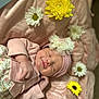 baby, blanket, closeup, cute, face, flower, hand, headband, indoors, infant, newborn, peaceful, pink_clothing, portrait, resting, skin, sleeping, soft_texture, white_flower, yellow_flower