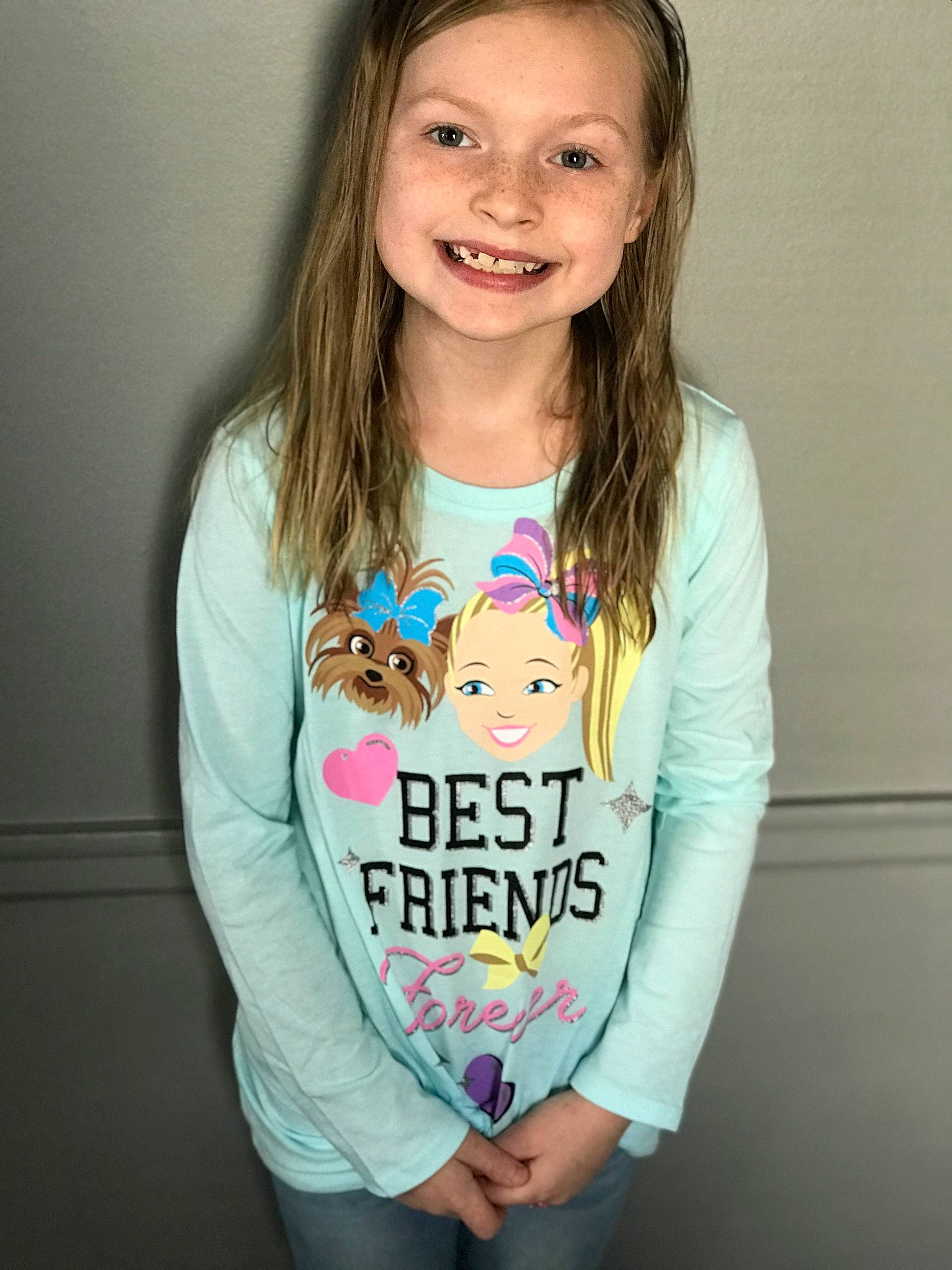 Alannah is registered to the contest to win money with this photo: active_shirt, arm, chest, child, cool, electric_blue, face, font, fun, gesture, happy, joy, neck, organ, pattern, person, shoulder, sleeve, smile, t_shirt