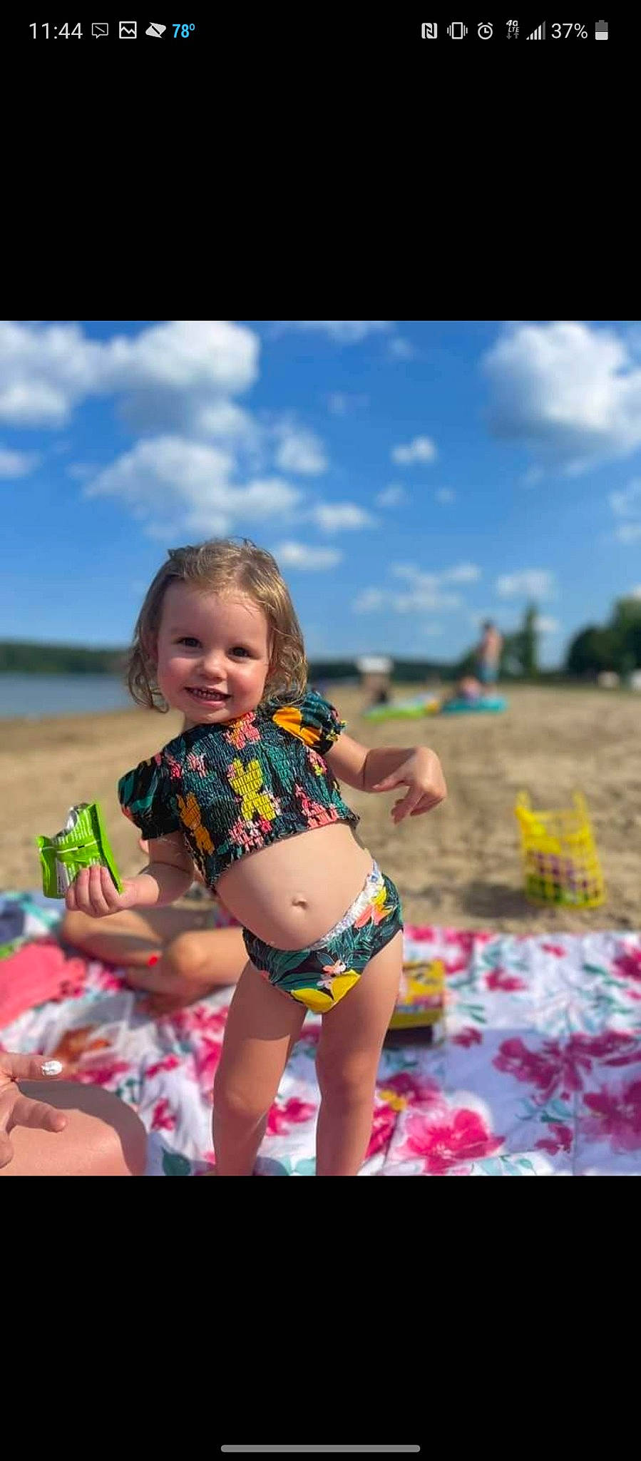 Ariah is registered to the contest to win money with this photo: baby, beach, brassiere, cloud, fun, grass, happy, human_leg, joy, leisure, people_in_nature, person, recreation, sky, smile, summer, swimwear, thigh, toddler, travel