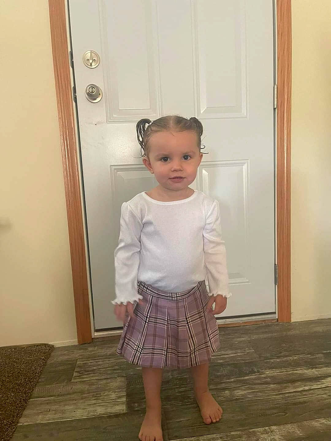 Ariah joined the competition — help win amazing prizes! baby_toddler_clothing, day_dress, door, dress, dress_shirt, fashion_design, flooring, home_door, leg, neck, one_piece_garment, pattern, person, pink, shoulder, sleeve, standing, toddler, trunk, waist