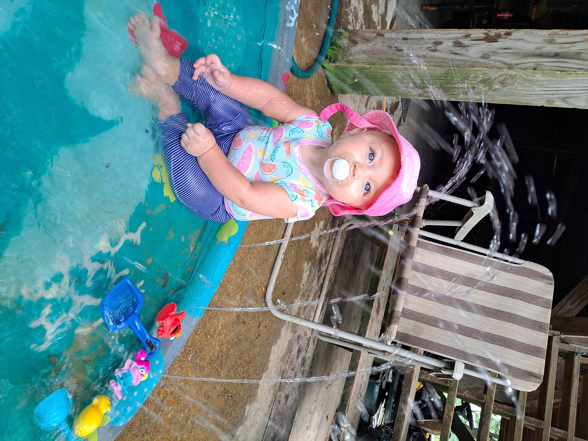 Khaleesi joined the competition — help win amazing prizes! baby_toddler_clothing, child, electric_blue, fun, happy, headwear, leisure, magenta, person, pink, play, recreation, smile, toddler, water, wood