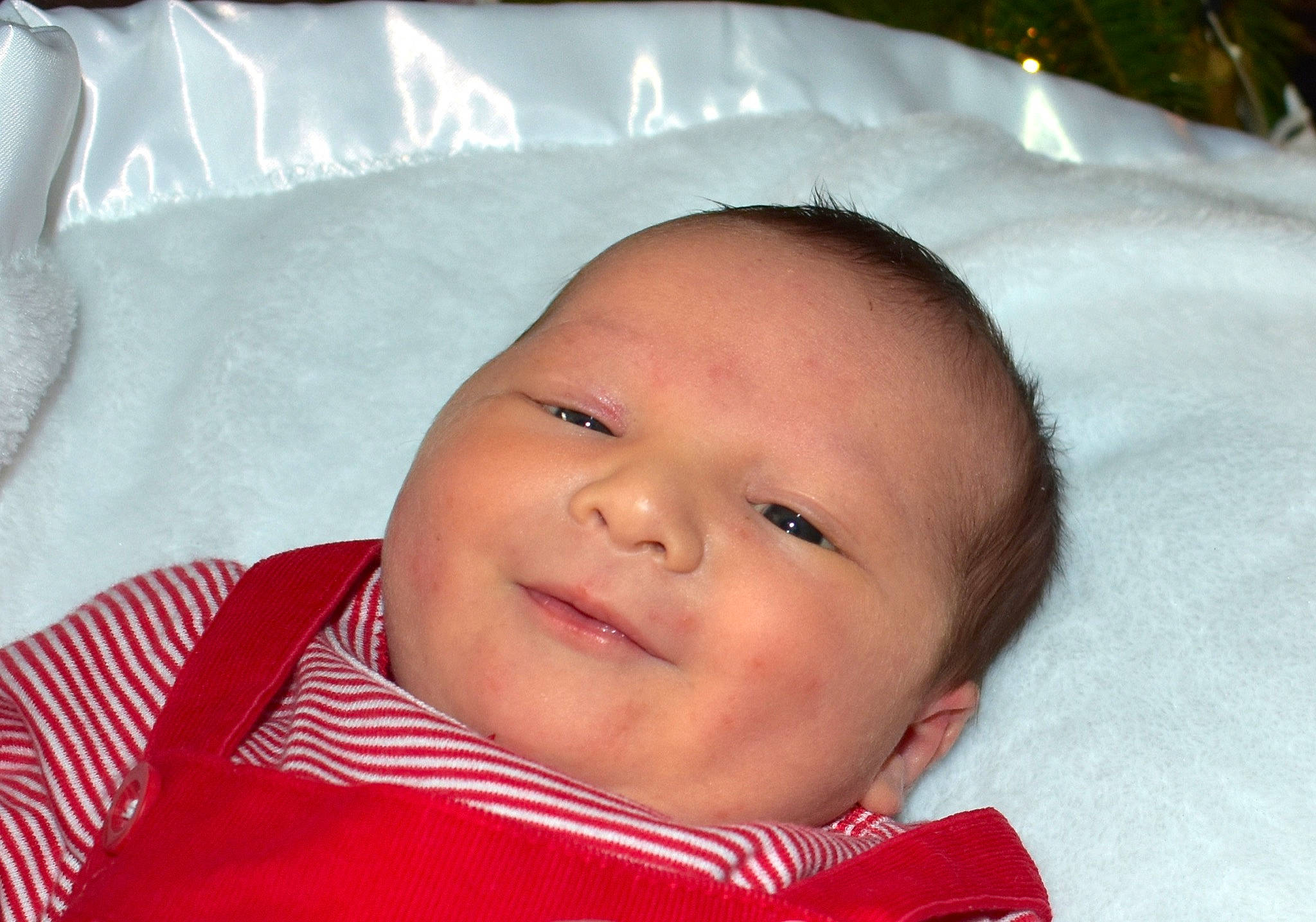 Charley is registered to the contest to win money with this photo: baby, cheek, child, chin, close_up, eye, face, forehead, head, lip, mouth, nose, person, skin, smile, toddler