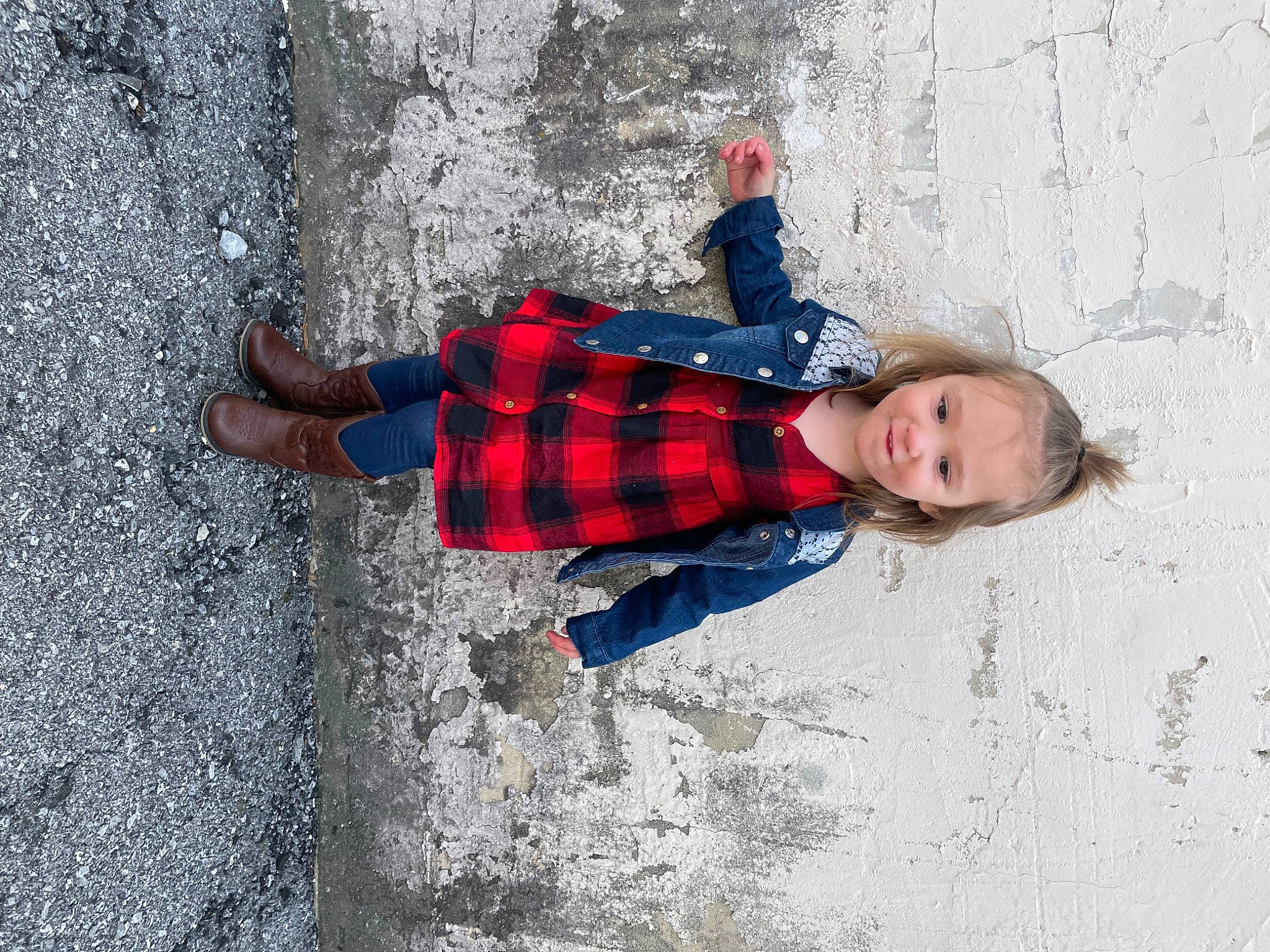 Charley is registered to the contest to win money with this photo: carmine, child, cobblestone, concrete, electric_blue, freezing, fun, leisure, pattern, person, plaid, recreation, road_surface, shadow, sidewalk, snow, street_fashion, tartan, toddler, tree