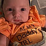 Adalynn joined the competition — help win amazing prizes! baby, infant, headband, orange_shirt, text_on_clothing, face, eyes, baby_seat, pattern, soft_lighting, closeup, child, cute, portrait, apparel, fabric, indoor, expression, person, toddler