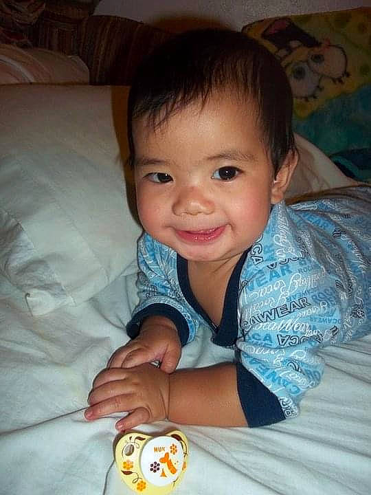 Sinahi is registered to the contest to win money with this photo: arm, baby, baby_toddler_clothing, cheek, chin, comfort, eye, face, finger, hand, happy, head, iris, joy, lip, mammal, mouth, nose, person, skin