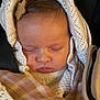 Mia participe au concours pour gagner de l'argent avec cette photo : baby, sleeping, blanket, knitted, plaid, hair_clip, face, infant, closeup, cozy, soft, peaceful, child, wrapped, portrait, indoors, warm_lighting, cute, serene, newborn