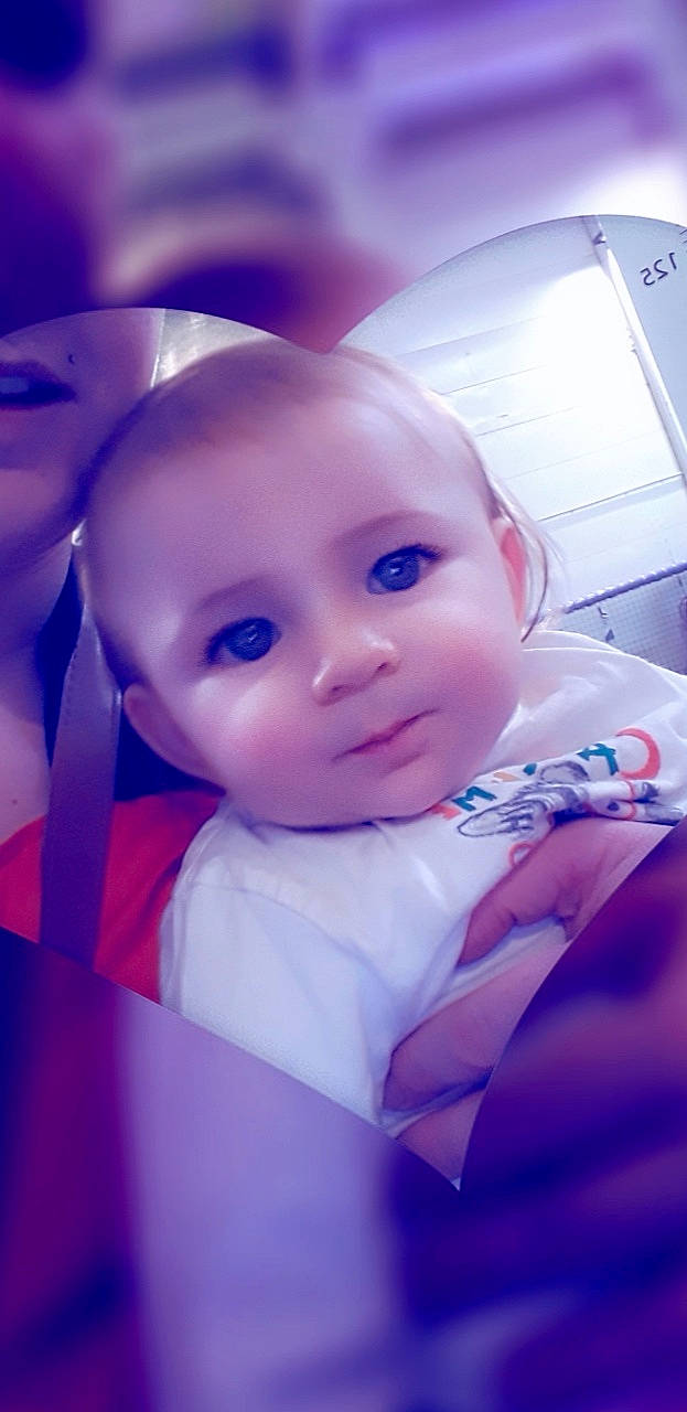 Telio participe au concours pour gagner de l'argent avec cette photo : baby, cheek, child, ear, eye, face, fun, head, lip, mouth, nose, person, photography, pink, purple, skin, smile, toddler