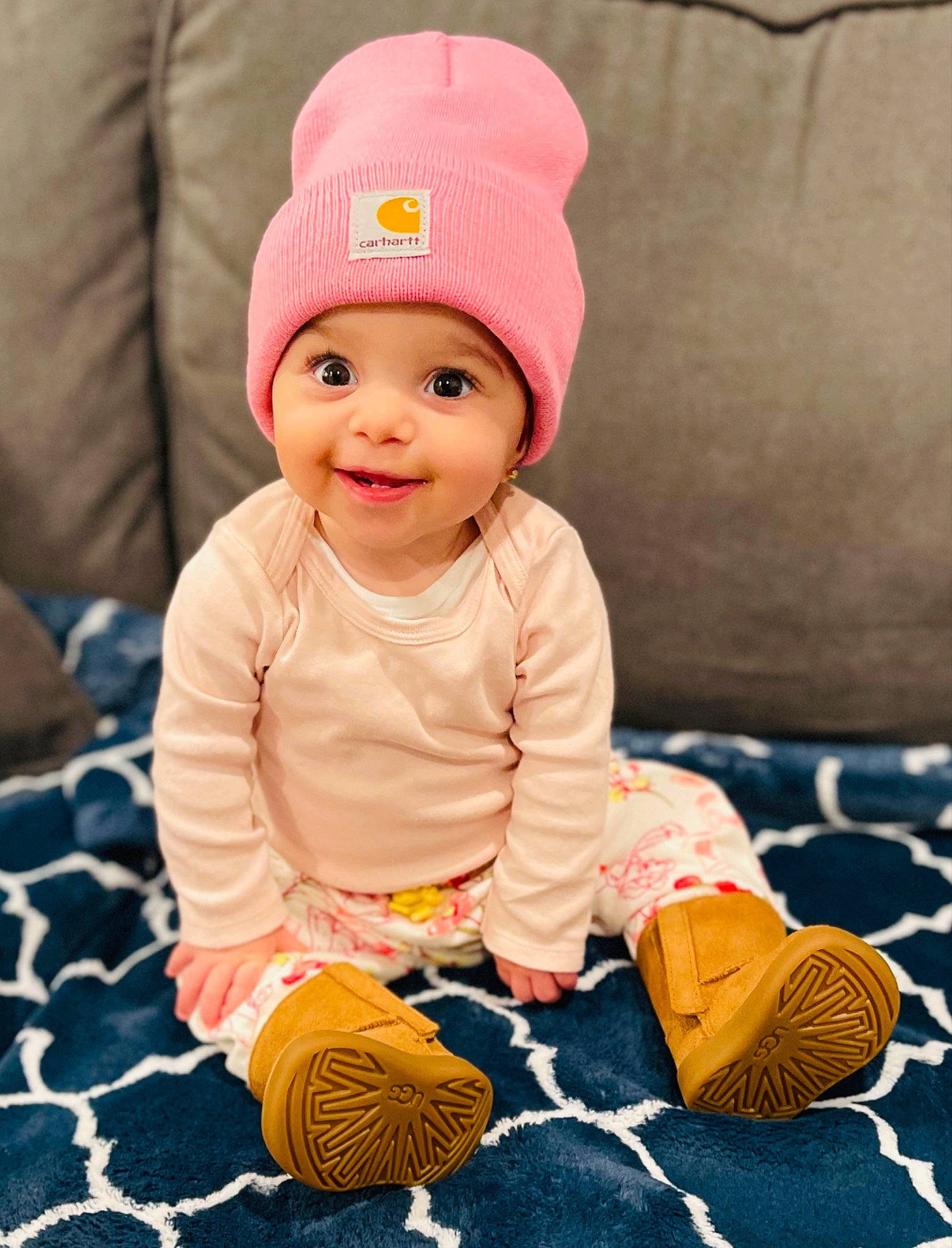 Emma joined the competition — help win amazing prizes! baby, baby_toddler_clothing, beanie, cap, cheek, child, fashion_accessory, happy, headwear, joy, knit_cap, magenta, pattern, person, pink, portrait_photography, product, sitting, skin, sleeve