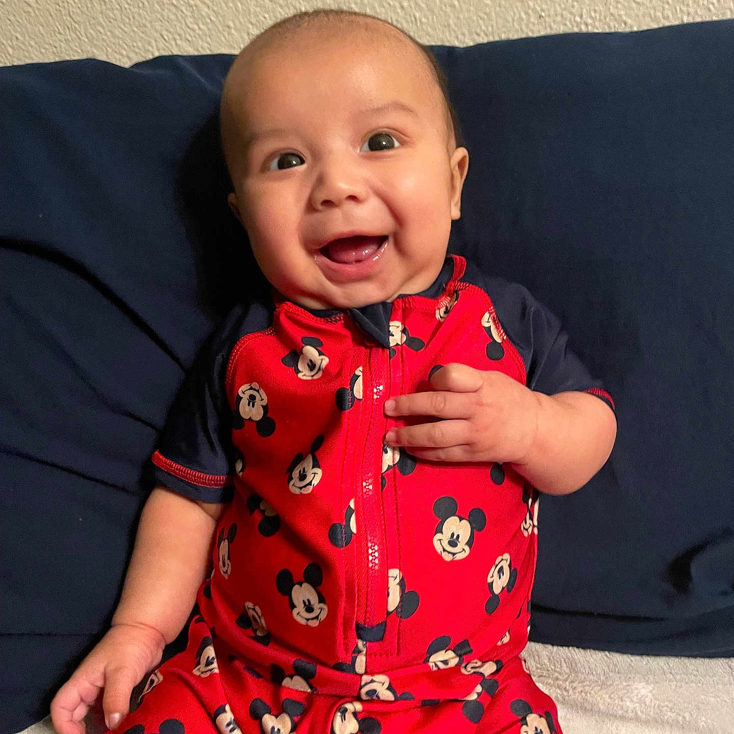 Jesús Esteban is registered to the contest to win money with this photo: architecture, baby, babylaughing, building, clothing, couch, cushion, dress, face, furniture, happy, head, homedecor, laughing, pajamas, person, photography, portrait, sitting, smile