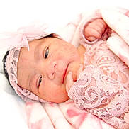 Athena joined the competition — help win amazing prizes! baby, newborn, infant, pink, lace, headband, blanket, soft, sleepy, cute, portrait, child, wrapped, hand, face, closeup, delicate, smile, skin, indoors