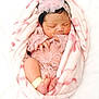 Athena is registered to the contest to win money with this photo: newborn, baby, sleeping, blanket, pink, lace, headband, wrapped, infant, soft, cute, peaceful, tiny, feet, hands, portrait, indoors, cozy, closeup, adorable