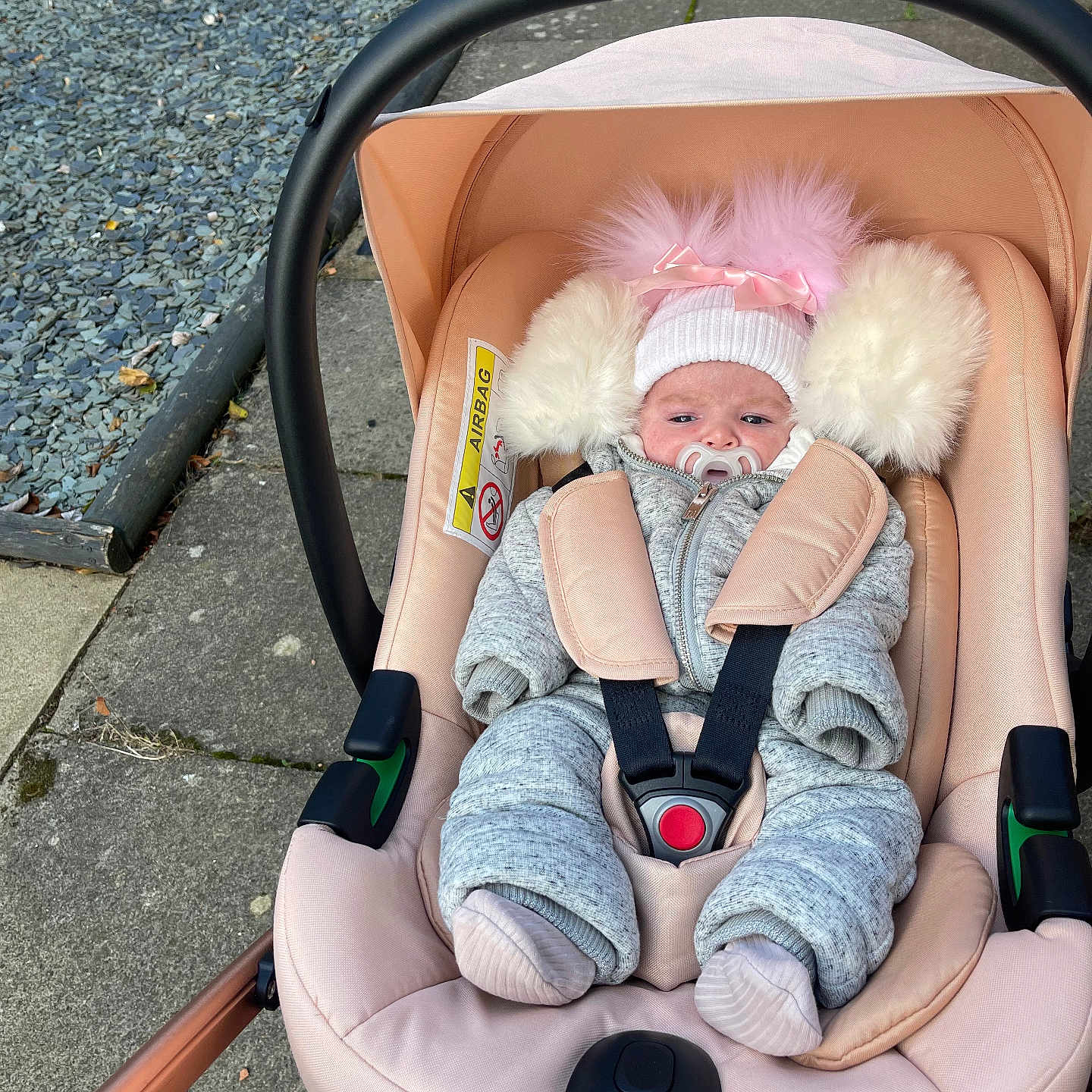 Millie Mae joined the competition — help win amazing prizes! baby, baby_clothes, bundle, car_seat, child, coat, gravel, gray, hat, infant, outdoor, pacifier, pavement, pink, pom_poms, seat_belt, sidewalk, stroller, warm, winter_clothing