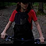 Ici-Piccoli a rejoint le concours — aidez-le/la à gagner de superbes lots ! person, cat, bicycle, forest, trail, backpack, red_shirt, outdoor, nature, animal, pet, cycling, wooded_area, adventure, wildlife, mesh_carrier, hands, trees, leisure, exploration