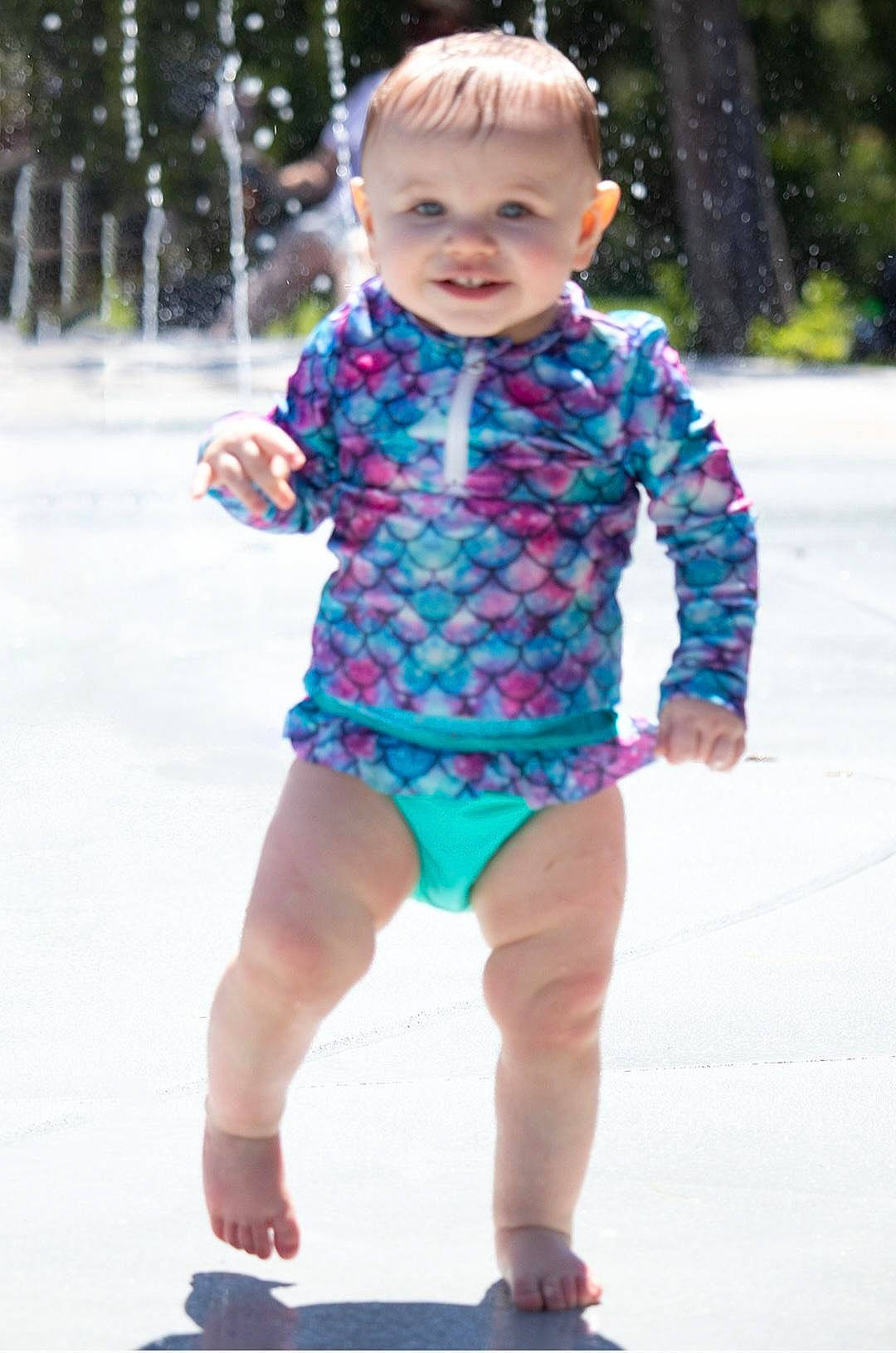 Georgia joined the competition — help win amazing prizes! baby_toddler_clothing, electric_blue, face, fun, grass, happy, head, joy, leisure, pattern, person, photograph, pink, recreation, shorts, shoulder, sleeve, smile, summer, thigh