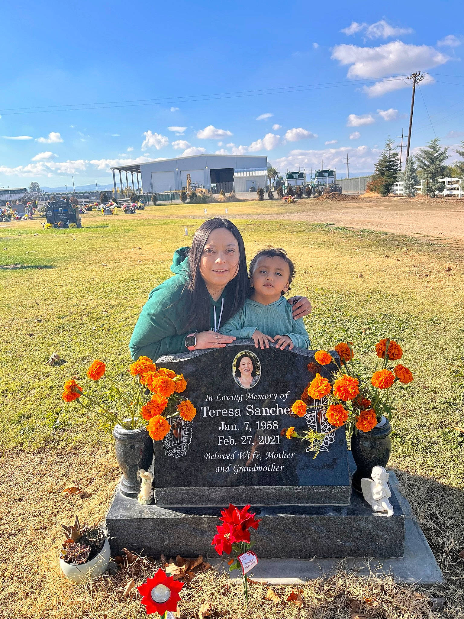 Jocelyn is registered to the contest to win money with this photo: agriculture, cloud, event, flower, grass, grassland, grave, happy, headwear, joy, landscape, natural_environment, orange, people, people_in_nature, person, plant, prairie, sky, smile