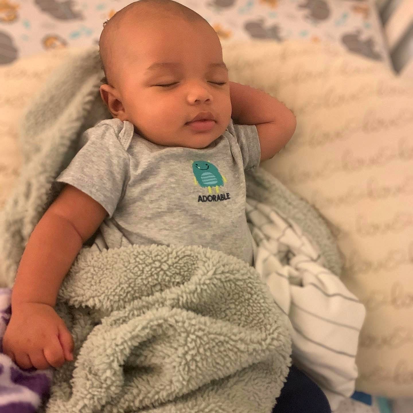 Jalen joined the competition — help win amazing prizes! baby, baby_sleeping, baby_toddler_clothing, cheek, child, comfort, happy, headgear, iris, linens, neck, nose, pattern, person, sitting, skin, sleeve, t_shirt, textile, toddler