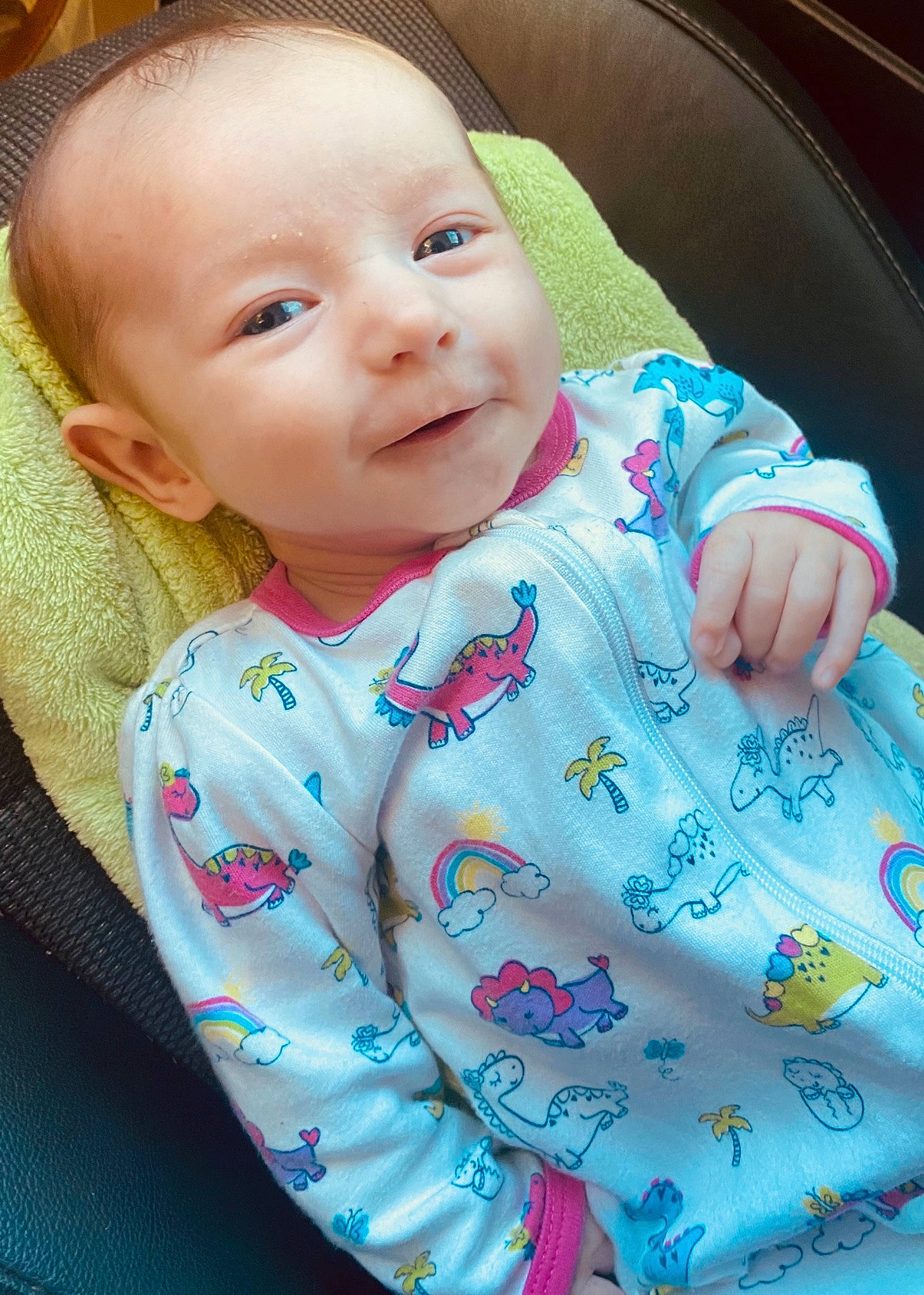 Charley is registered to the contest to win money with this photo: baby, baby_toddler_clothing, cheek, chin, comfort, eye, eyebrow, face, gesture, iris, lip, mouth, nose, organ, person, pink, skin, sleeve, smile, textile