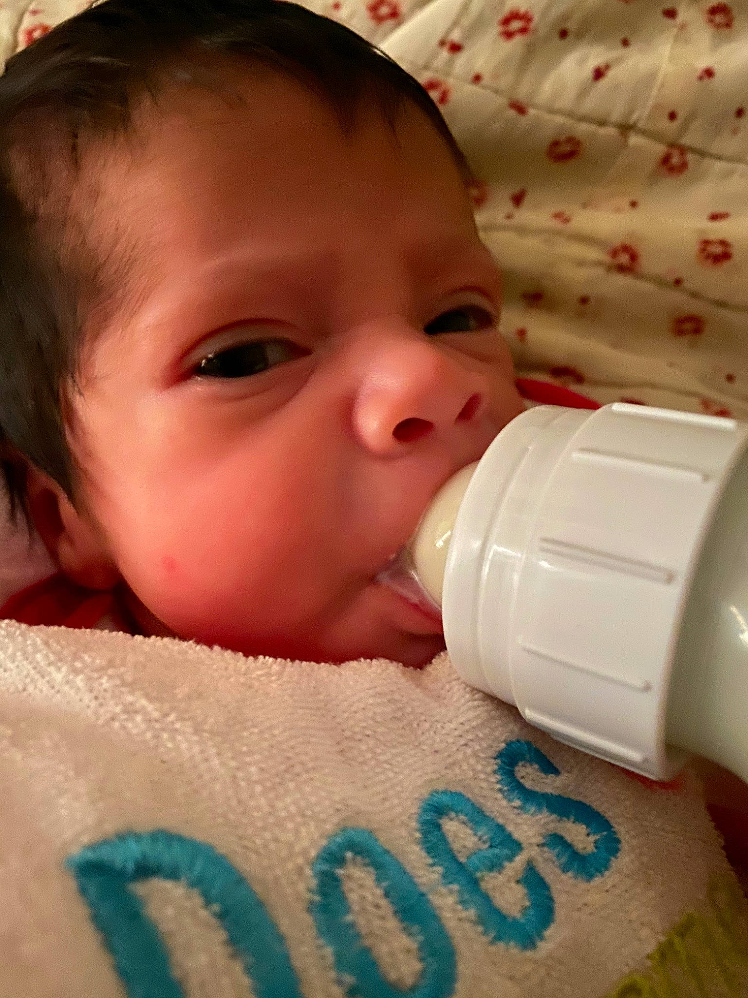 Chanel is registered to the contest to win money with this photo: baby, baby_bottle, baby_products, bottle, cheek, child, drinkware, face, head, infant_formula, lip, mouth, nose, person, plastic_bottle, product, skin, tableware, toddler