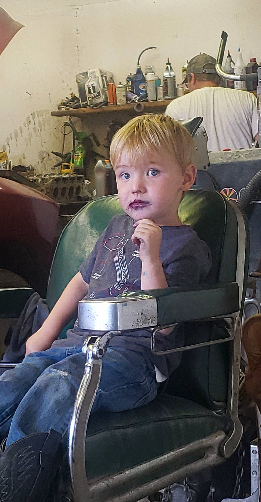 Elliott is registered to the contest to win money with this photo: auto_part, automotive_design, baby, baby_carriage, baby_products, beauty_salon, car_seat, chair, child, comfort, fun, hairstyle, lap, luxury_vehicle, motor_vehicle, person, room, sitting, steering_wheel, toddler