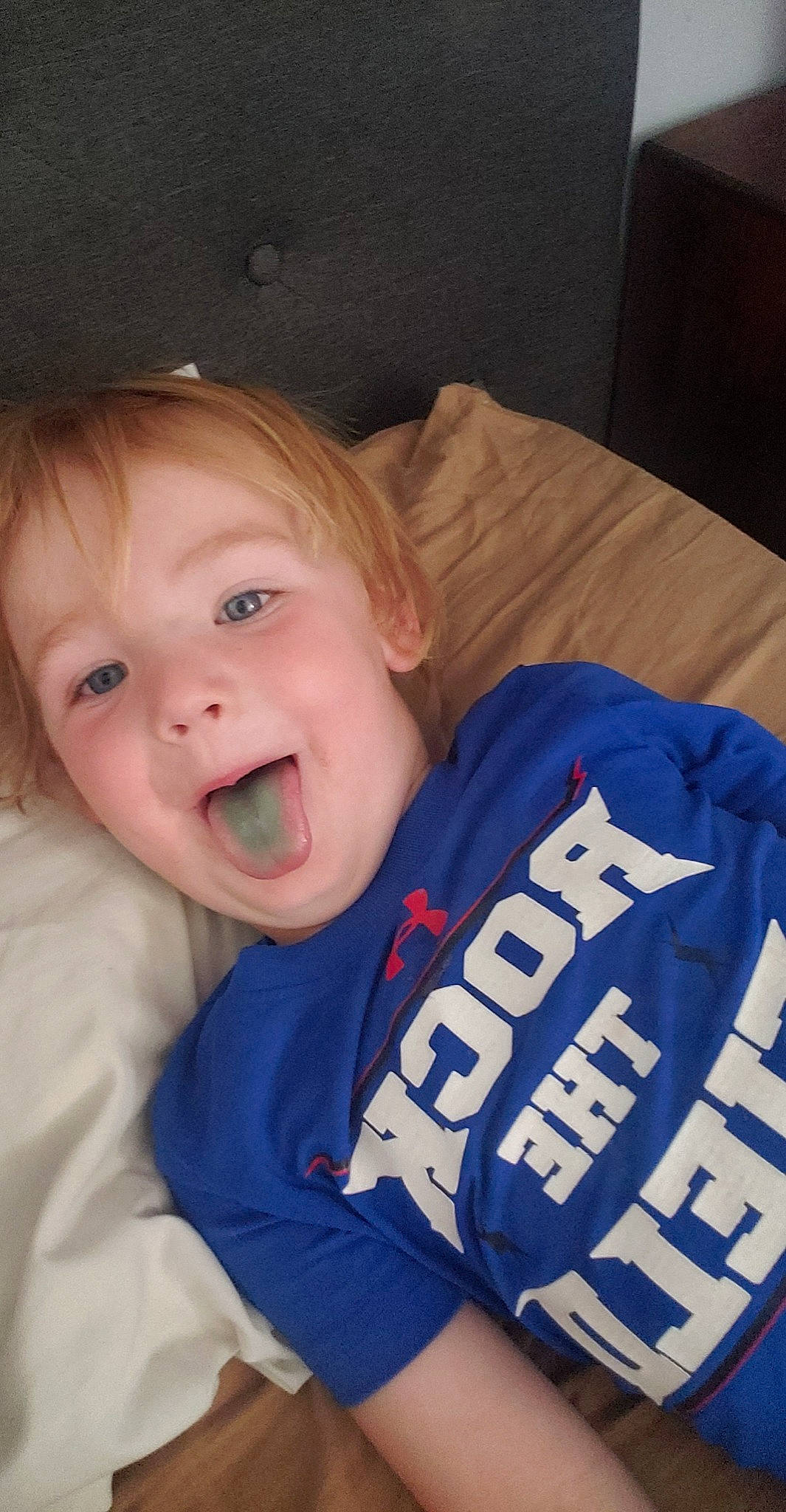 Elliott is registered to the contest to win money with this photo: baby, cheek, chin, comfort, eye, eyebrow, face, gesture, hair, happy, head, iris, lip, mouth, neck, nose, person, sleeve, smile, toddler