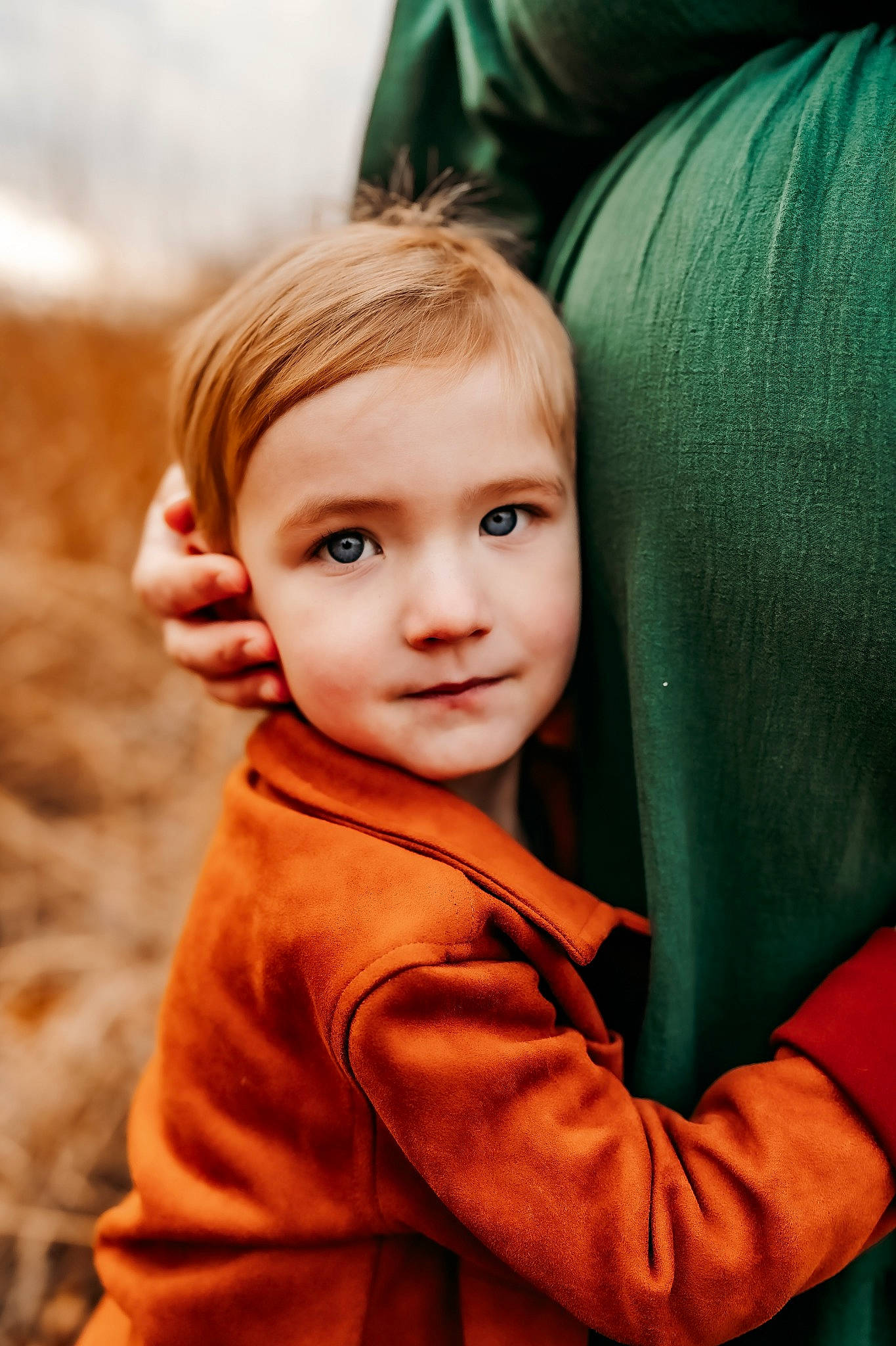 Elliott joined the competition — help win amazing prizes! beauty, blond, cheek, chin, electric_blue, flash_photography, fun, gesture, grass, happy, head, nose, outerwear, person, shoulder, sitting, sleeve, smile, toddler, tree