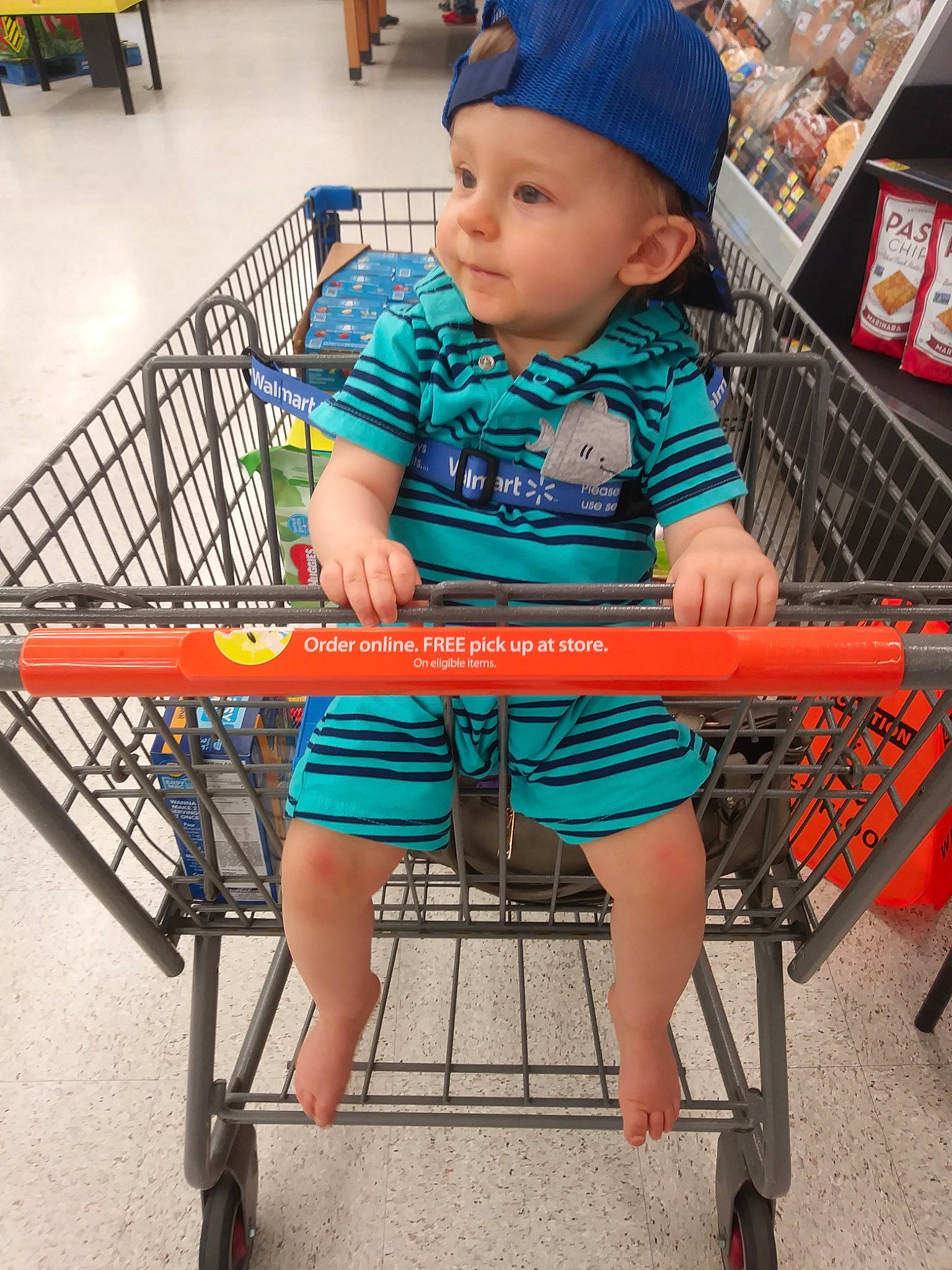 Kasen joined the competition — help win amazing prizes! baby, cap, cart, chair, child, furniture, leg, person, product, shopping, shopping_cart, sitting, supermarket, thigh, toddler, vacation, vehicle