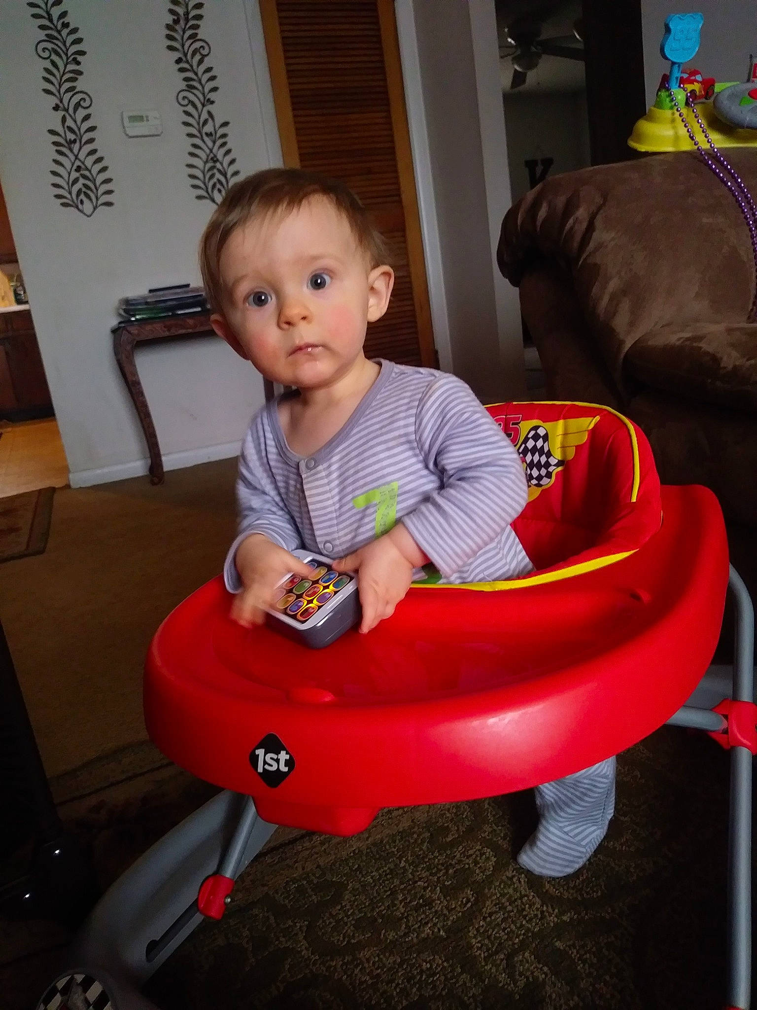 Kasen is registered to the contest to win money with this photo: baby, baby_toys, child, fun, person, play, riding_toy, sitting, surprise, toddler, toy