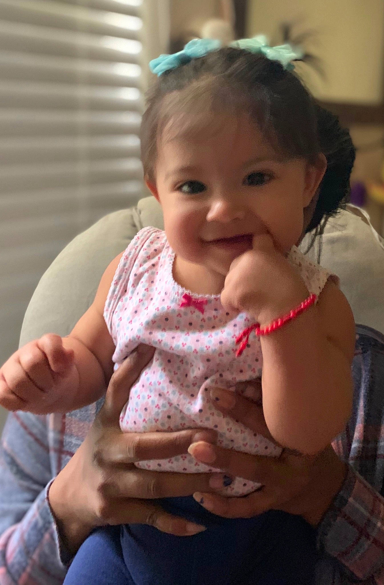 Sia is registered to the contest to win money with this photo: baby, cheek, child, finger, joy, person, sitting, skin, thumb, toddler