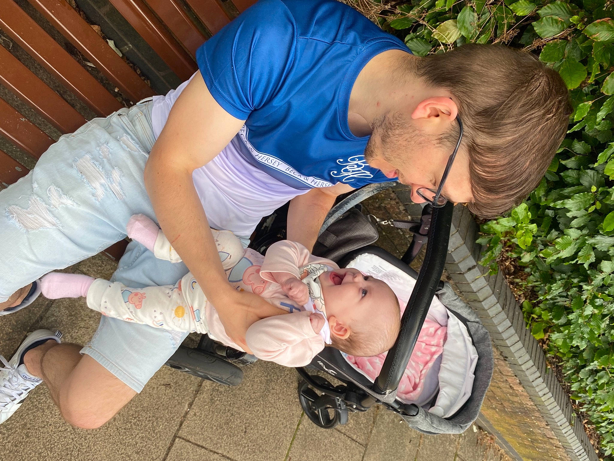 Ruxandra is registered to the contest to win money with this photo: baby, baby_products, child, elbow, event, fun, grass, happy, human_leg, joint, knee, lap, leisure, people_in_nature, person, plant, recreation, shorts, sitting, thigh