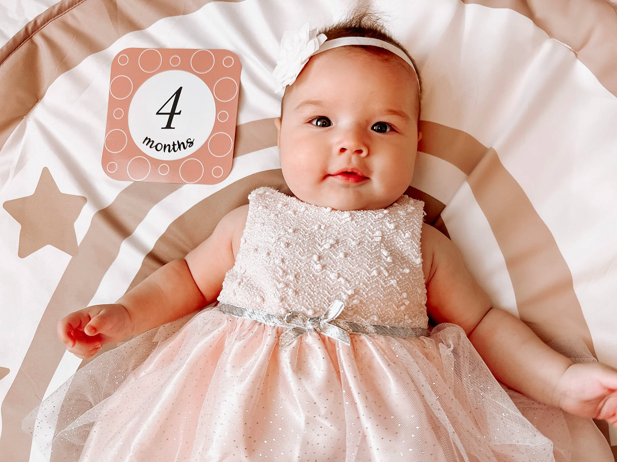Liliana joined the competition — help win amazing prizes! baby, baby_toddler_clothing, beauty, day_dress, dress, embellishment, eyelash, facial_expression, finger, hairstyle, happy, headpiece, one_piece_garment, person, pink, product, skin, sleeve, textile, toddler