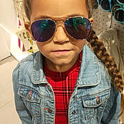Linaya participe au concours pour gagner de l'argent avec cette photo : child, girl, sunglasses, denim_jacket, plaid_dress, braided_hair, indoor, retail_store, fashion, clothing, accessories, shopping, portrait, person, casual_wear, reflection, standing, hair_style, cool, style