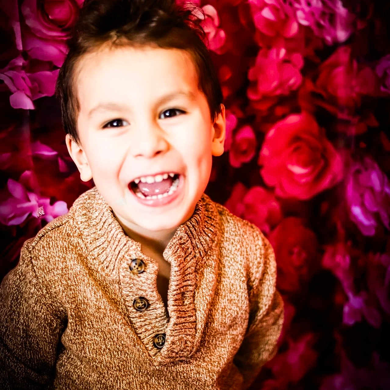 Henry is registered to the contest to win money with this photo: accessories, baby, babylaughing, bodypart, carnation, clothing, coat, cosmetics, dahlia, dress, earring, face, finger, flower, flowerarrangement, flowerbouquet, geranium, hand, happy, head