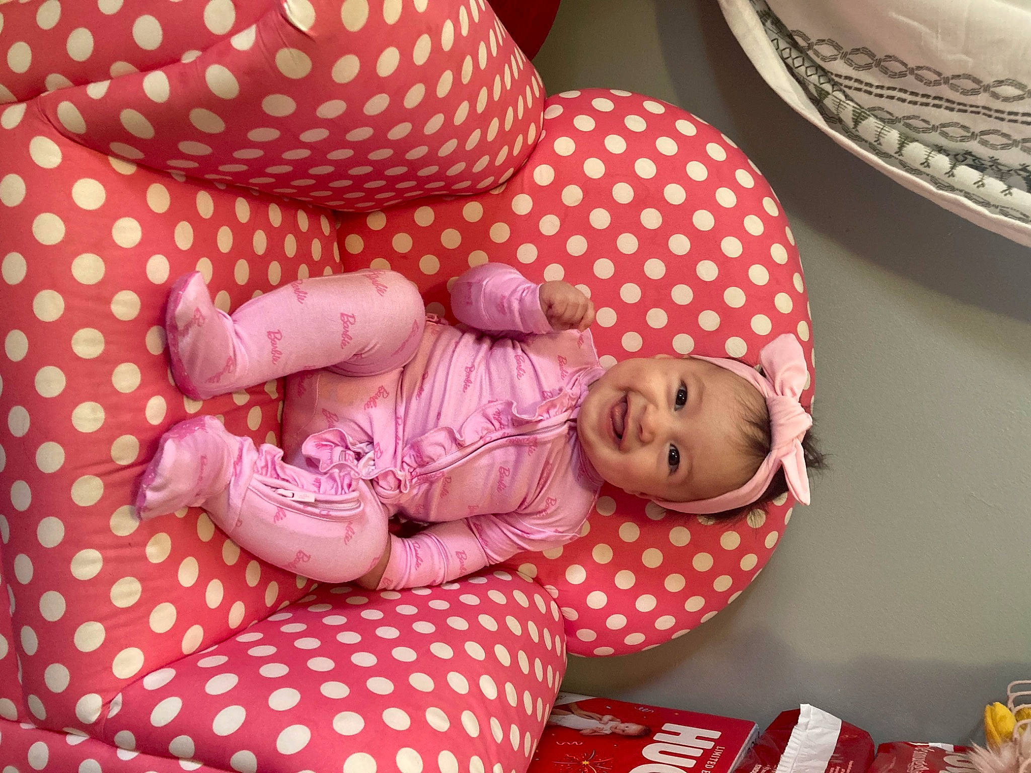 Emma joined the competition — help win amazing prizes! baby, baby_products, baby_toddler_clothing, bed_sheet, bedding, child, comfort, dishware, happy, joy, linens, magenta, pattern, peach, person, pillow, pink, room, serveware, sleeve
