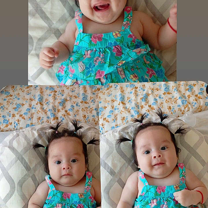 Ainara Jazmin participe au concours pour gagner de l'argent avec cette photo : baby, bed, blue_dress, child, cute, expression, floral_pattern, girl, happy, indoors, infant, lying_down, person, pigtails, pillow, portrait, skin, sleepwear, smiling, young