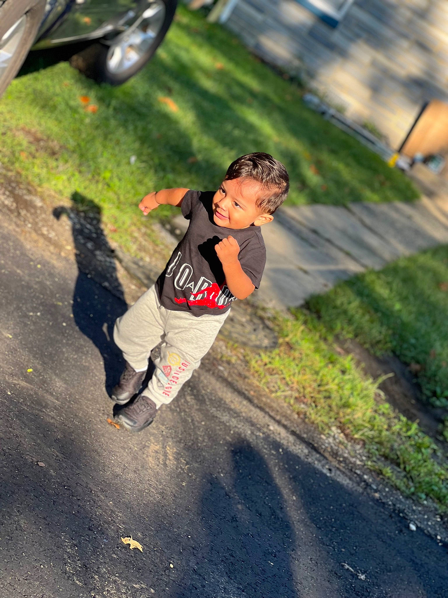 Emilio joined the competition — help win amazing prizes! asphalt, automotive_exterior, automotive_tire, exercise, flash_photography, fun, grass, happy, leisure, person, recreation, road, running, shoe, sneakers, soil, sports, sportswear, t_shirt, tire