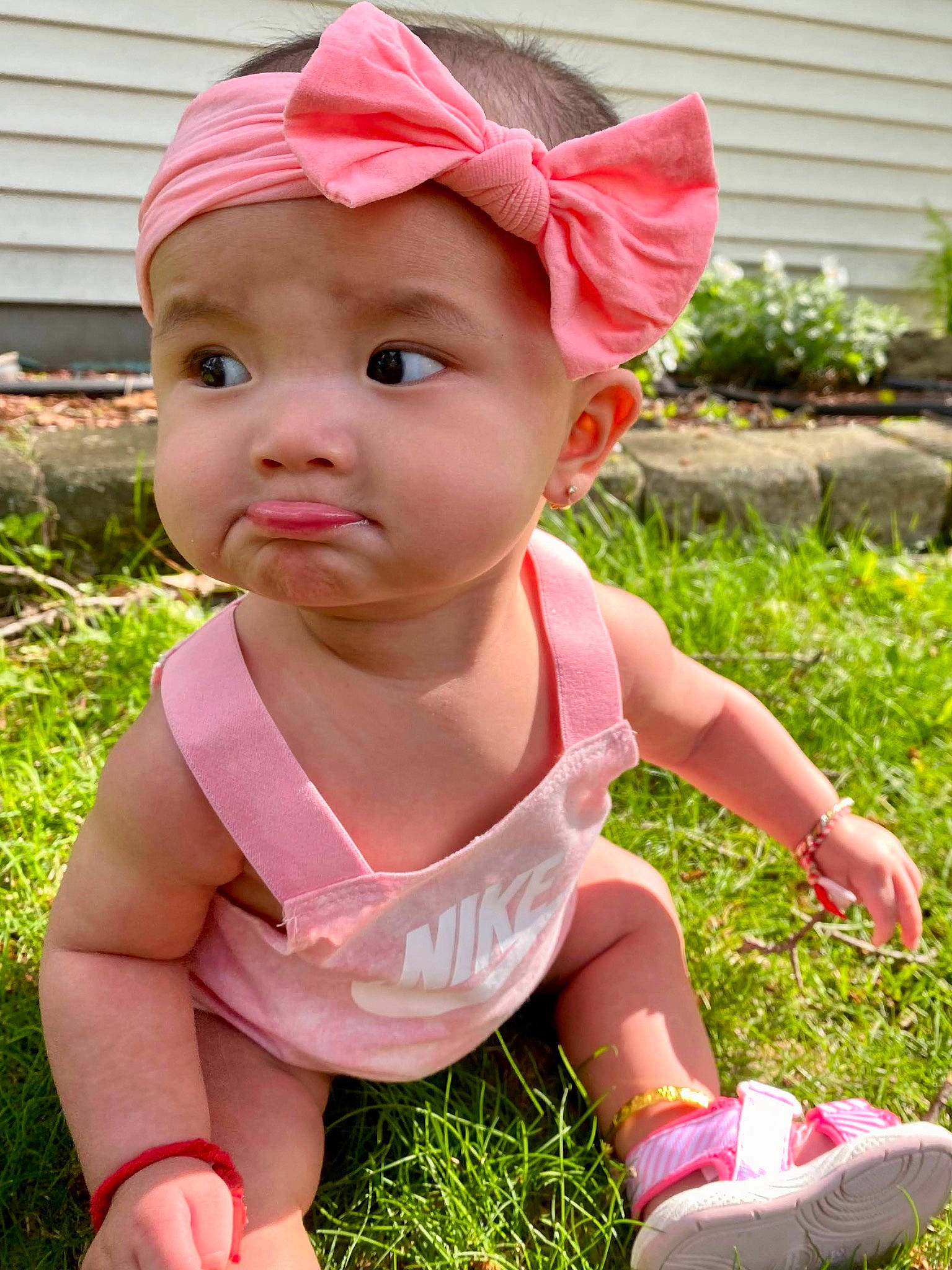 Jade joined the competition — help win amazing prizes! baby, baby_toddler_clothing, cap, child, clothing, costume_hat, fashion_accessory, fun, grass, happy, hat, headwear, human_leg, magenta, people_in_nature, person, pink, plant, sitting, summer