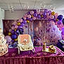 baby, baby_rocker, balloon, butterfly, cake, birthday, celebration, child, decoration, dress, event, face, festive, flower, girl, indoor, party, pink, purple, table