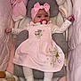 Hosanna a rejoint le concours — aidez-le/la à gagner de superbes lots ! baby, child, crib, pink, dress, headband, pacifier, plush_toys, stuffed_animals, tinkerbell, white_tights, shoes, bows, cute, infant, sleeping_area, soft_toys, comfort, indoors, resting