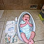 baby, infant, smiling, plastic_seat, tiled_floor, diapers, towel, baby_lotion, onesie, clapping_hands, happy, indoors, child, floor, baby_care, baby_clothing, baby_bath, cute, joyful, small_seat