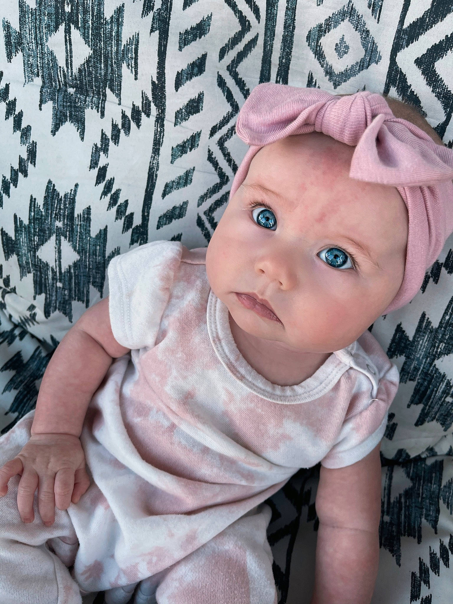 Aniyah is registered to the contest to win money with this photo: baby, baby_products, baby_toddler_clothing, cap, cheek, child, eye, eyebrow, eyelash, face, fashion_accessory, iris, linens, lip, pattern, person, pink, skin, sleeve, toddler