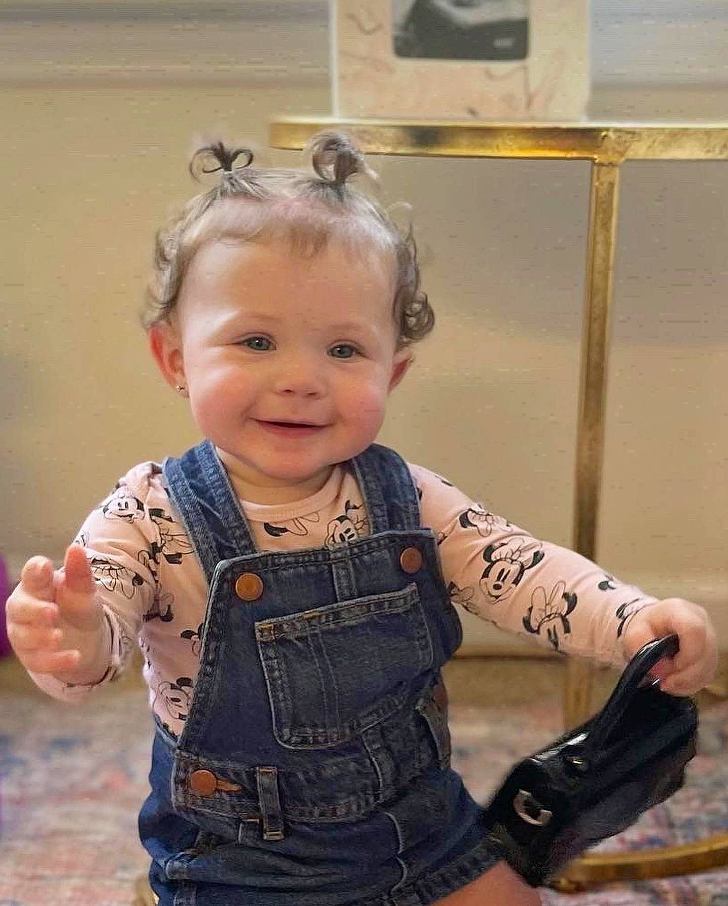 Erin is registered to the contest to win money with this photo: arm, baby, baby_toddler_clothing, cheek, chest, child, face, facial_expression, fun, gesture, happy, iris, joy, person, skin, sleeve, smile, standing, t_shirt, toddler